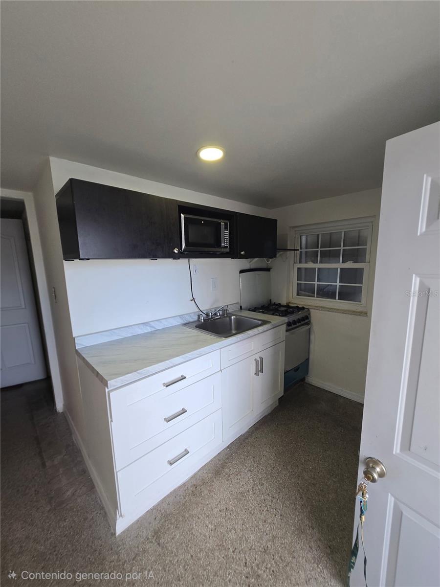 7710 W HANNA AVE — photo 24