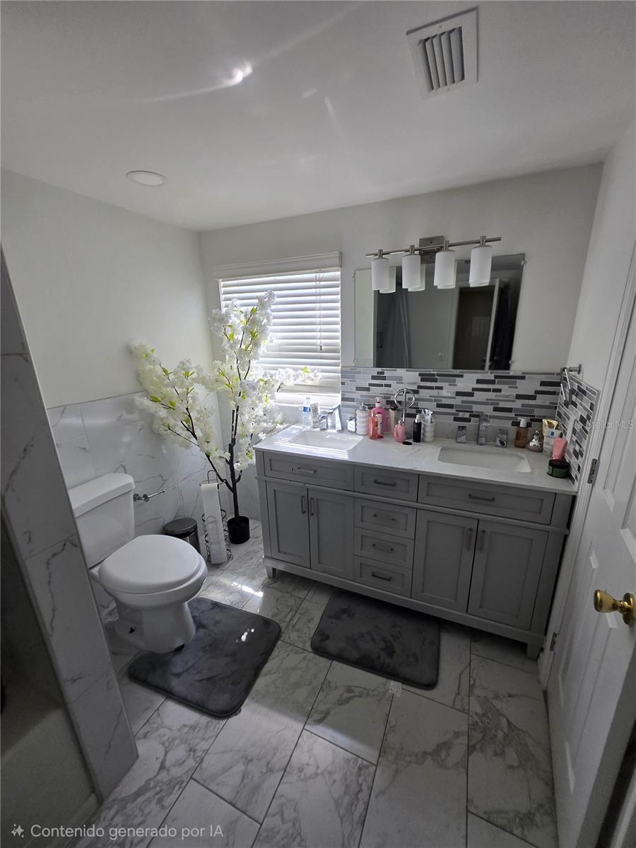 7710 W HANNA AVE — photo 16