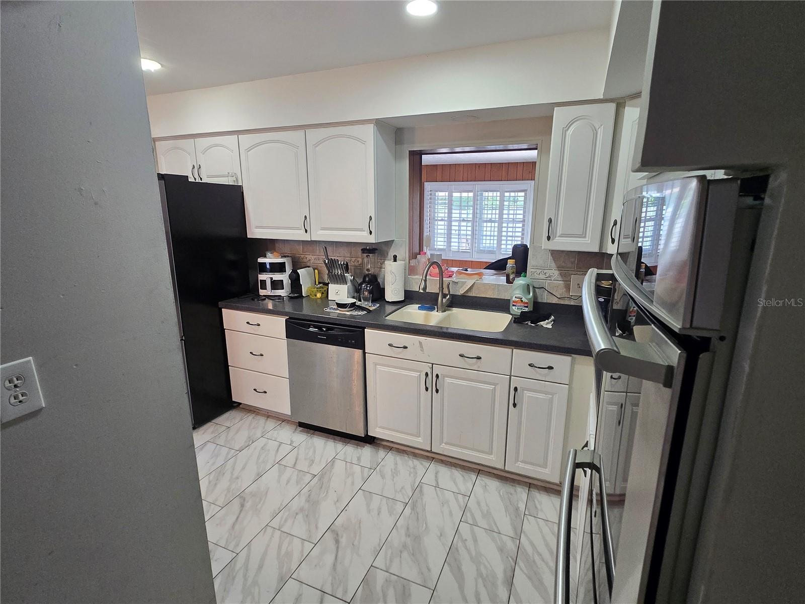 7710 W HANNA AVE — photo 4