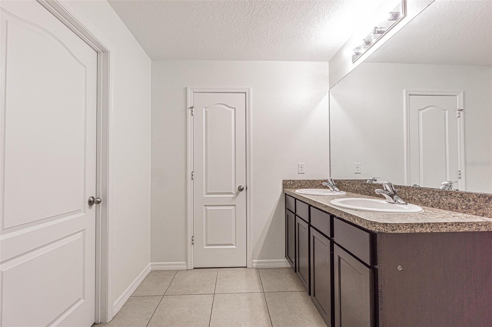 10536 WHISPERING HAMMOCK DR — photo 22