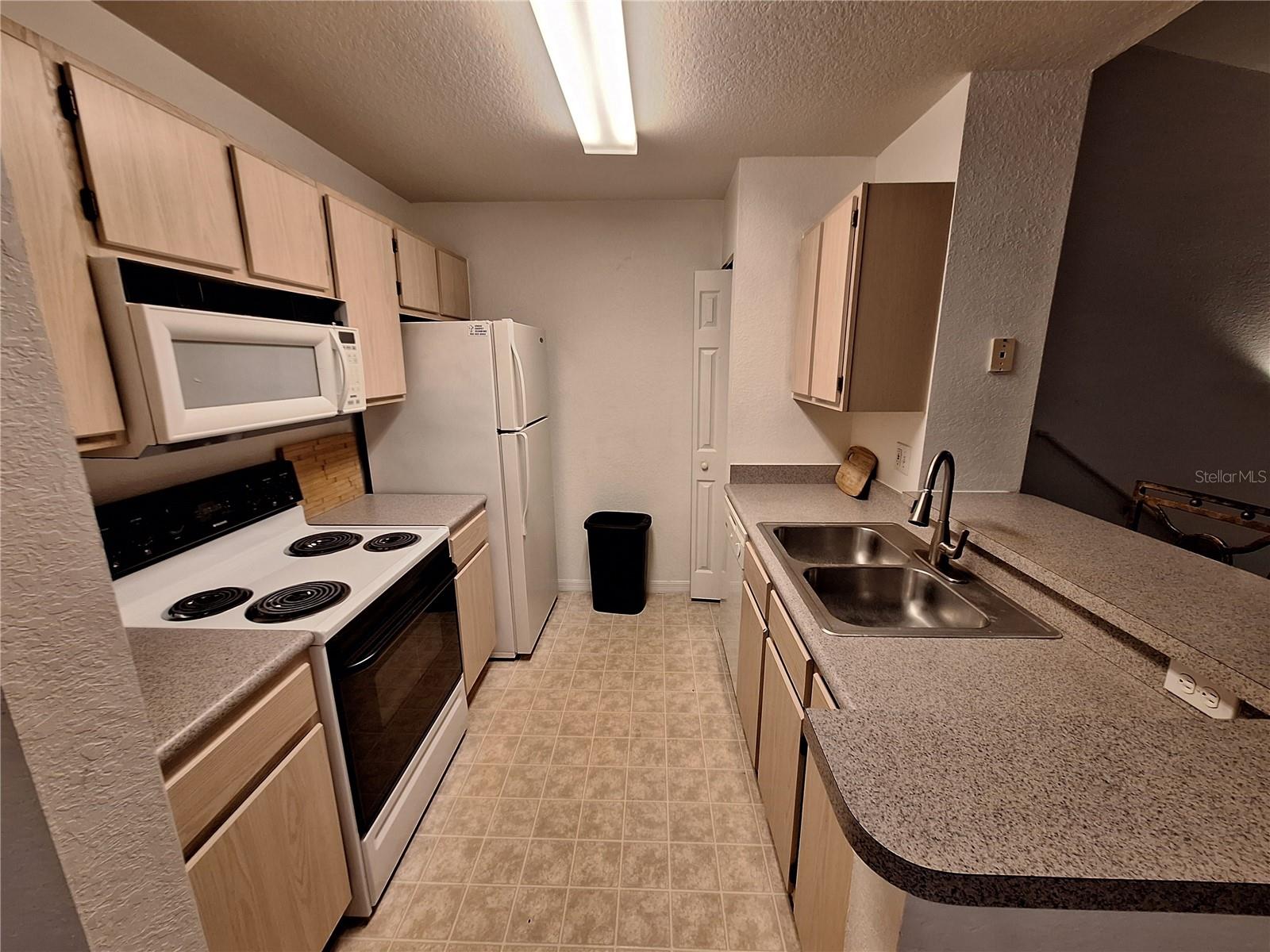 8809 MANOR LOOP #203 — photo 10