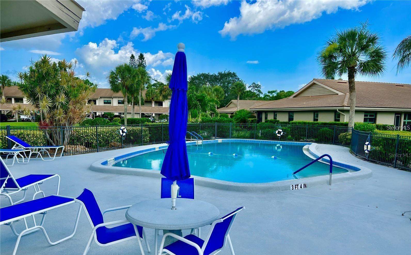 7143 WOOD CREEK DR #203 — photo 2