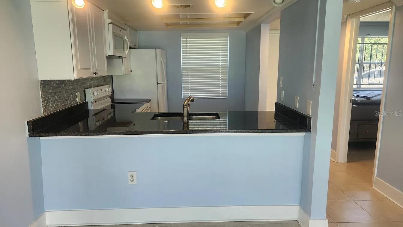 5038 TERRACE PALMS CIR #102 — photo 3