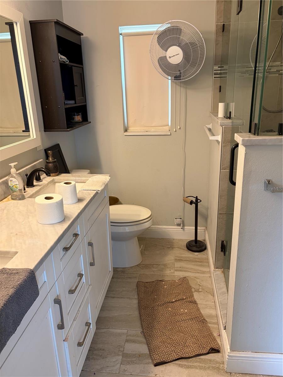 10325 N ARMENIA AVE — photo 17