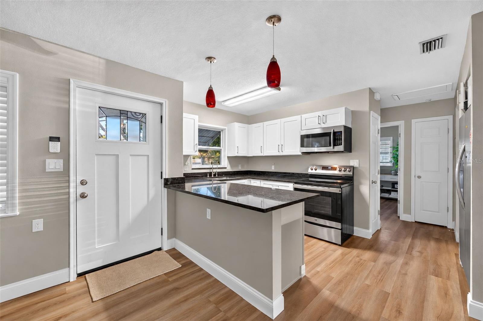 9398 SUN ISLE DR NE — photo 8