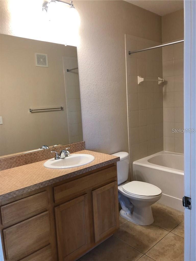 10205 COURTNEY PALMS BLVD #203 — photo 11