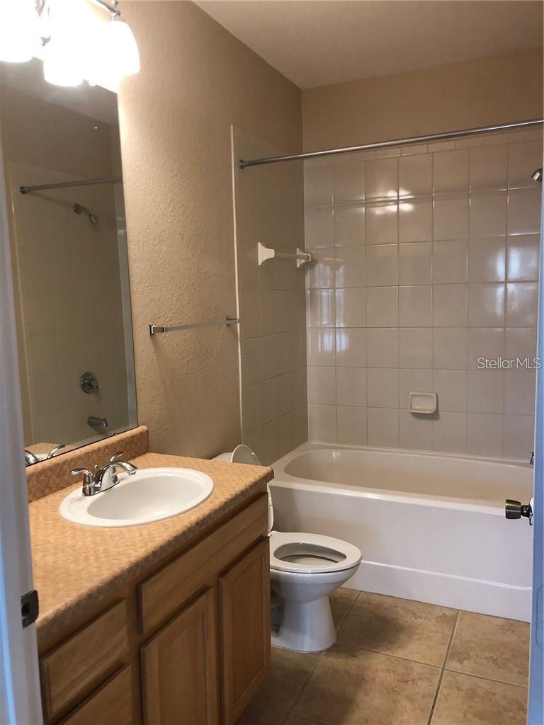 10205 COURTNEY PALMS BLVD #203 — photo 14