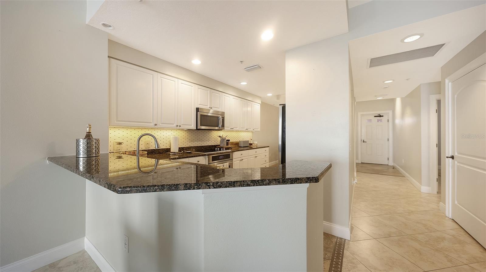 606 RIVIERA DUNES WAY #207 — photo 10