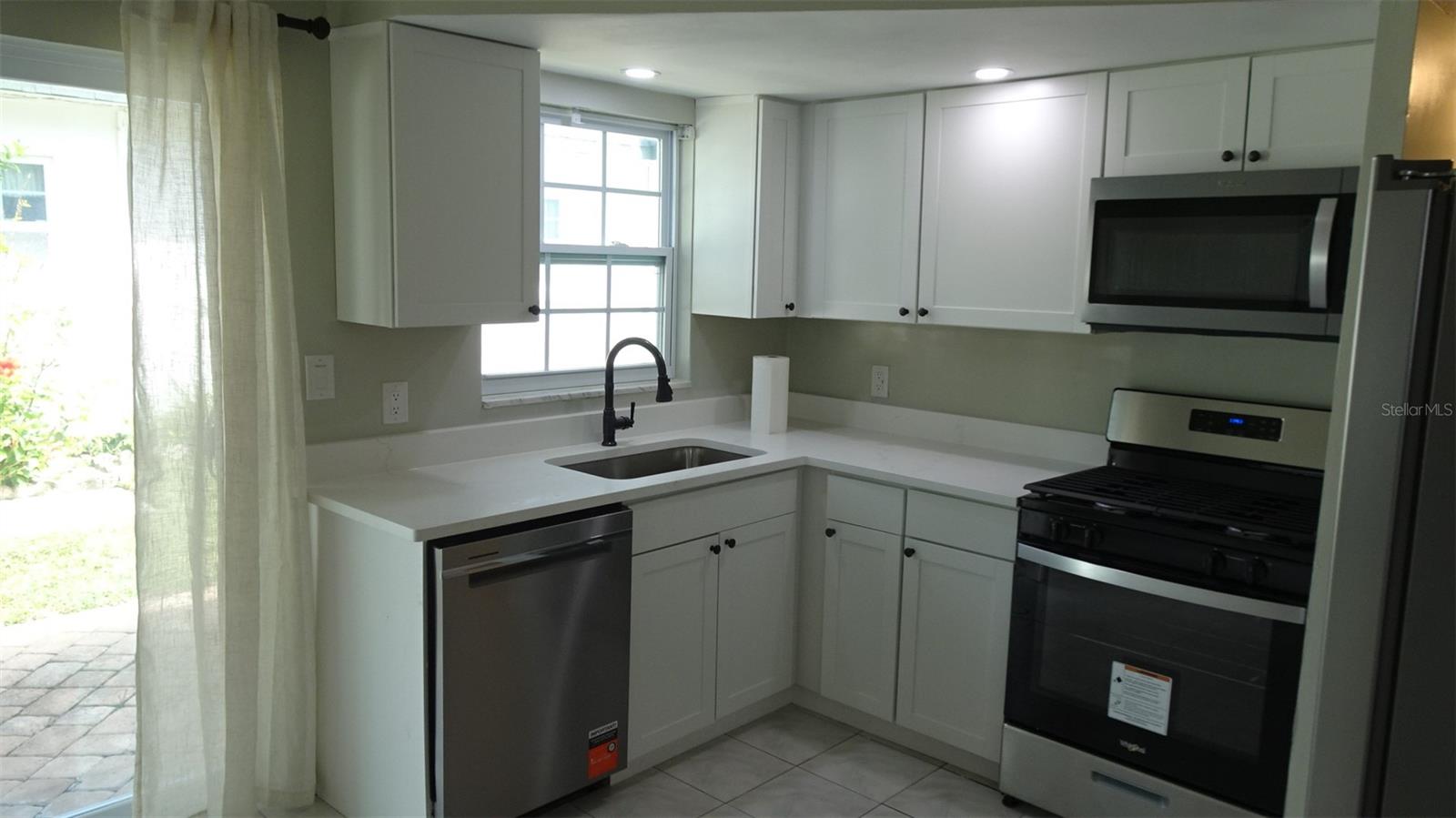 7809 38TH TER N — photo 12