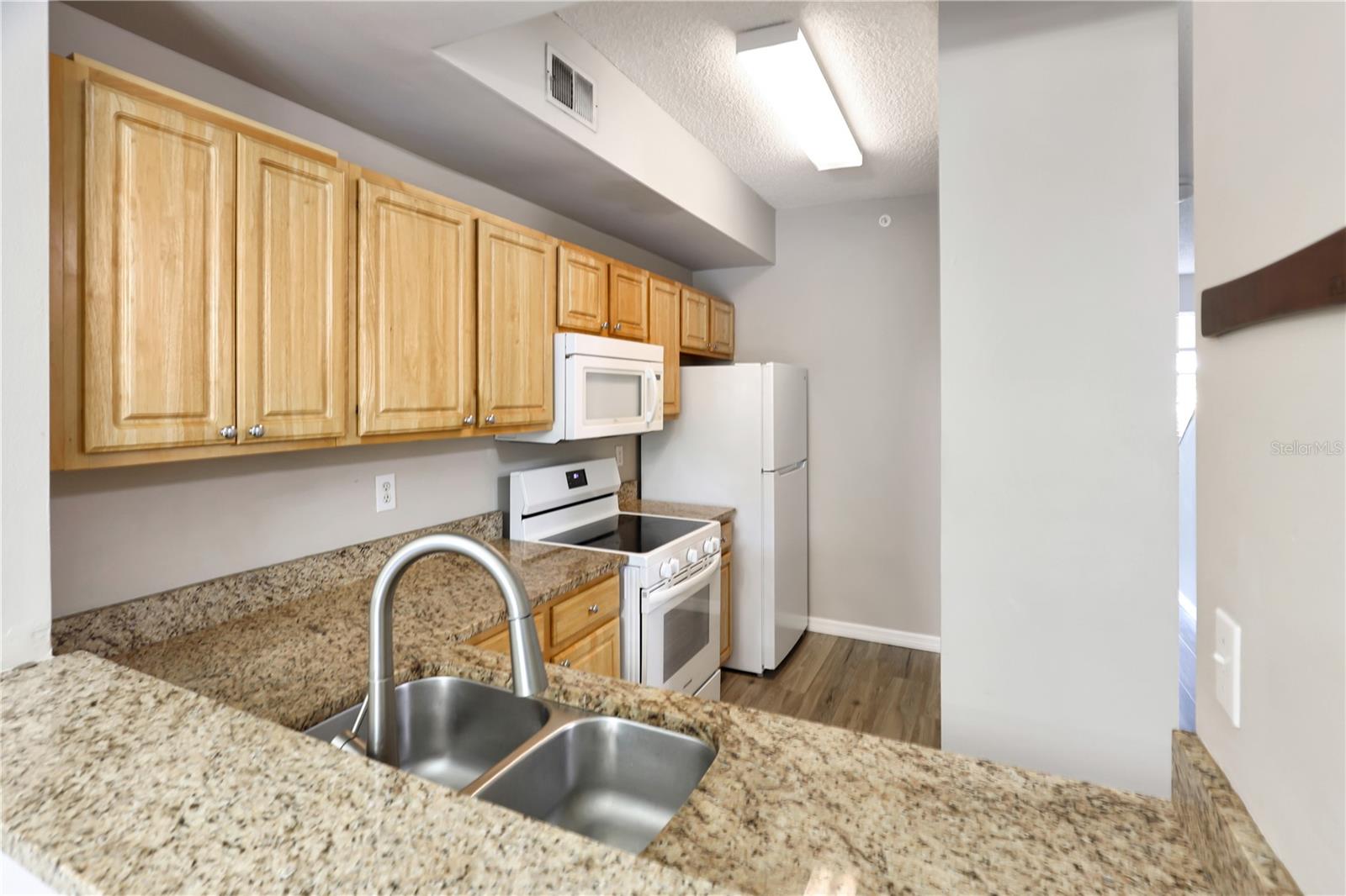 5700 BENTGRASS DR #16-211 — photo 3