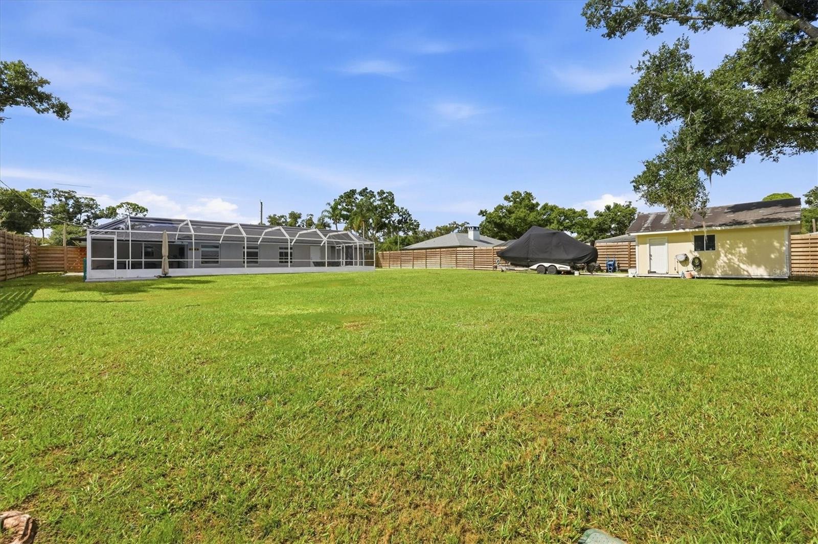 5605 SAWGRASS RD — photo 38
