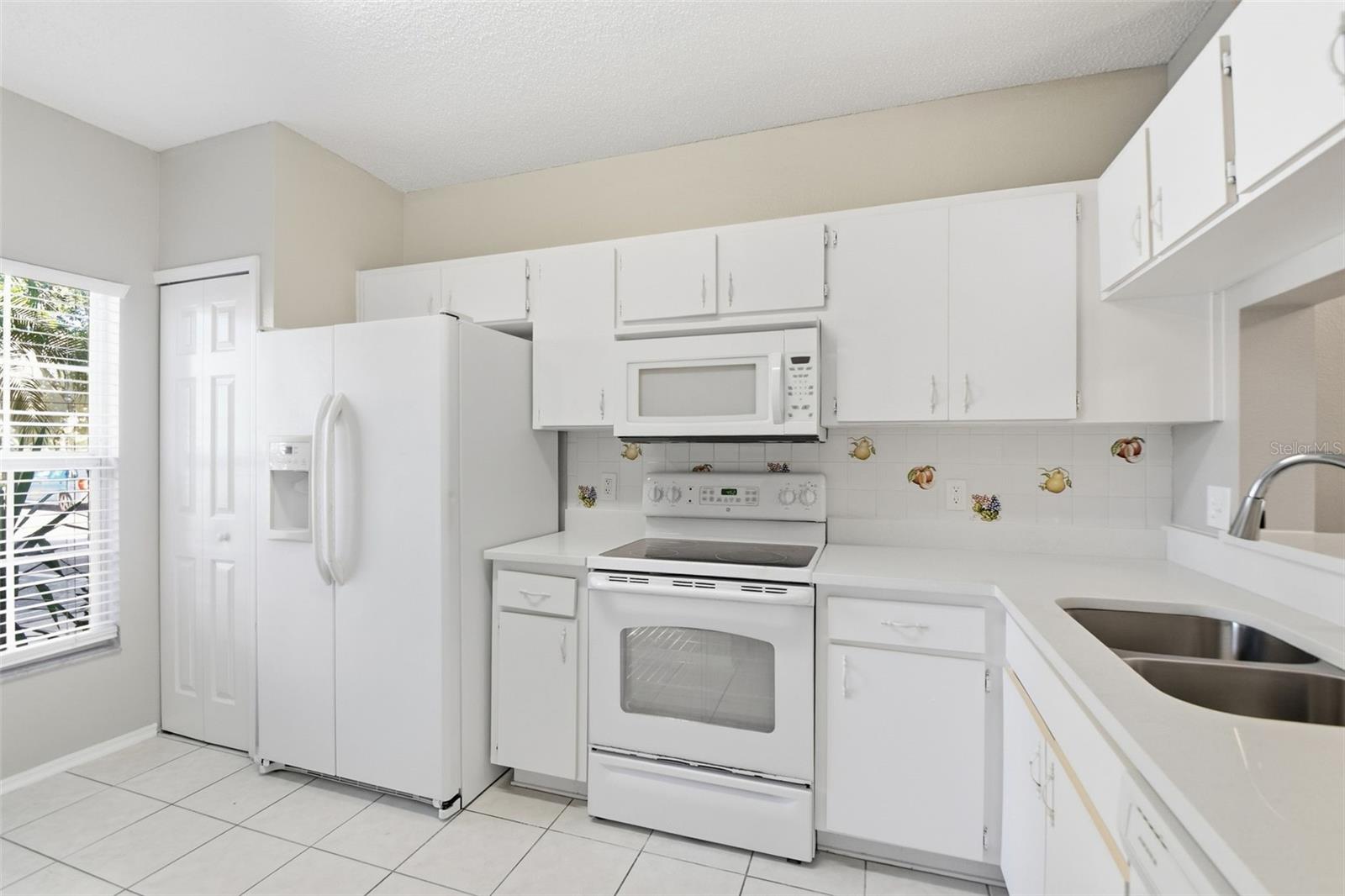 5512 CARROLLWOOD KEY DR — photo 21