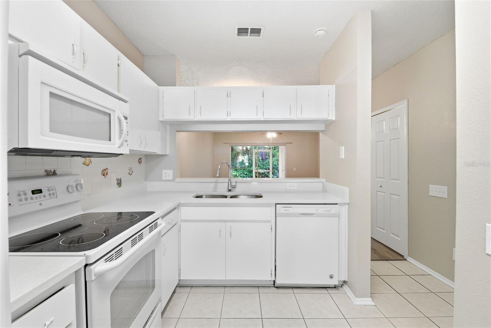 5512 CARROLLWOOD KEY DR — photo 26
