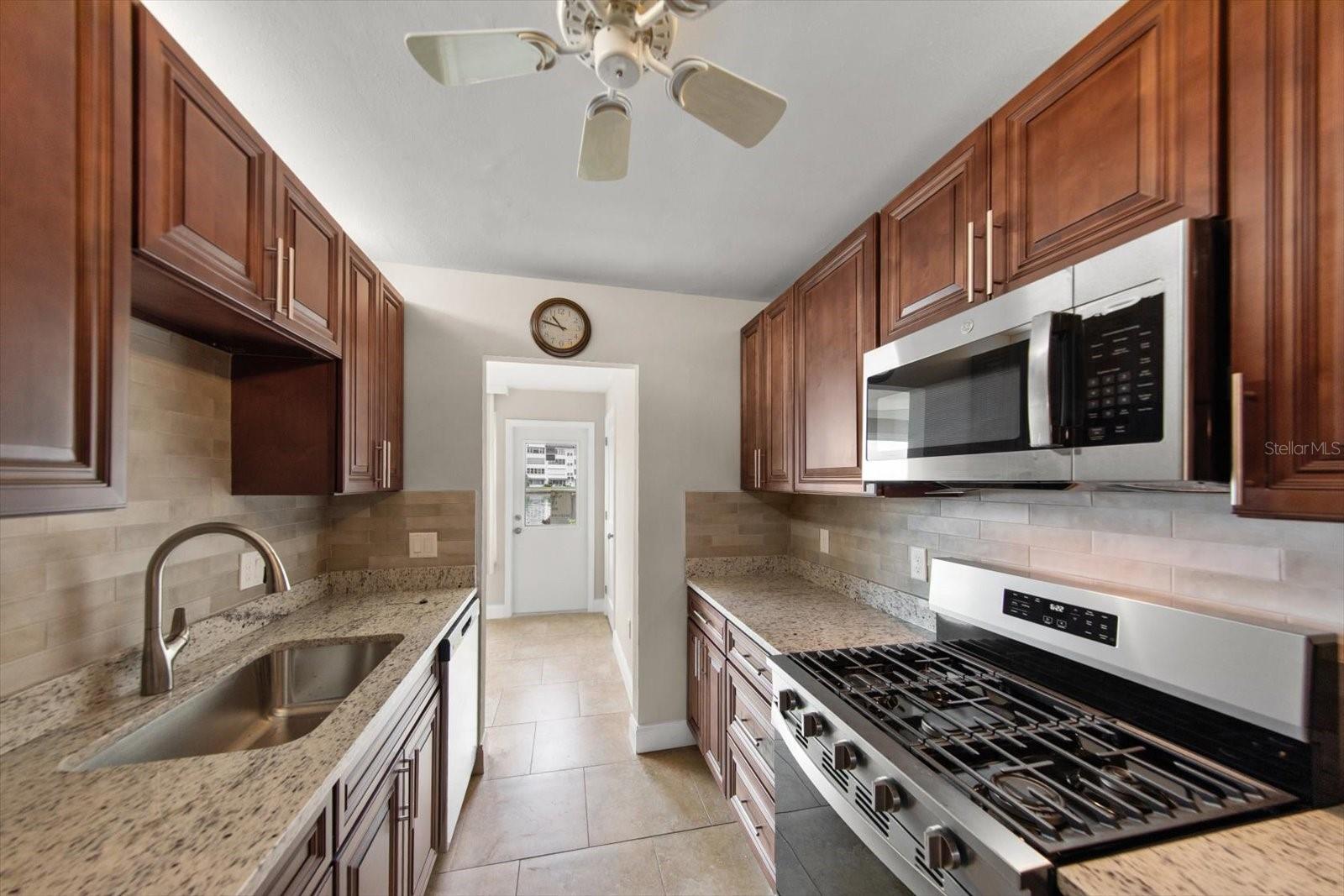 6025 SHORE BLVD S #107 — photo 12