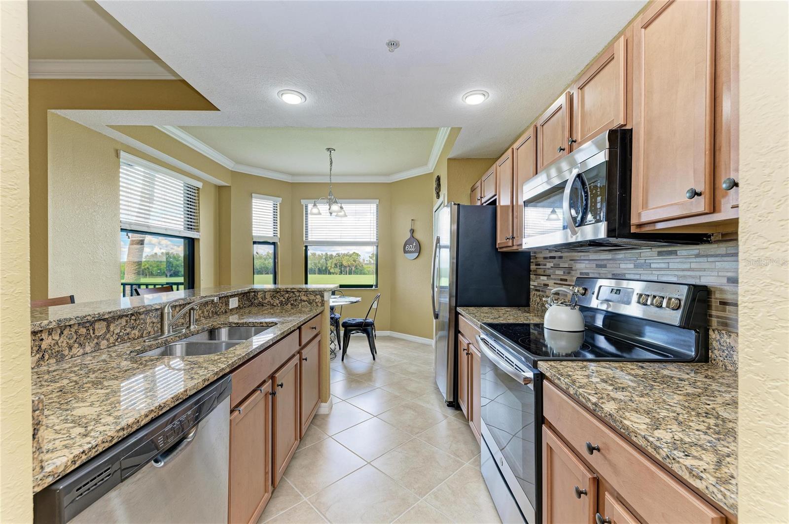 7019 RIVER HAMMOCK DR #202 — photo 20