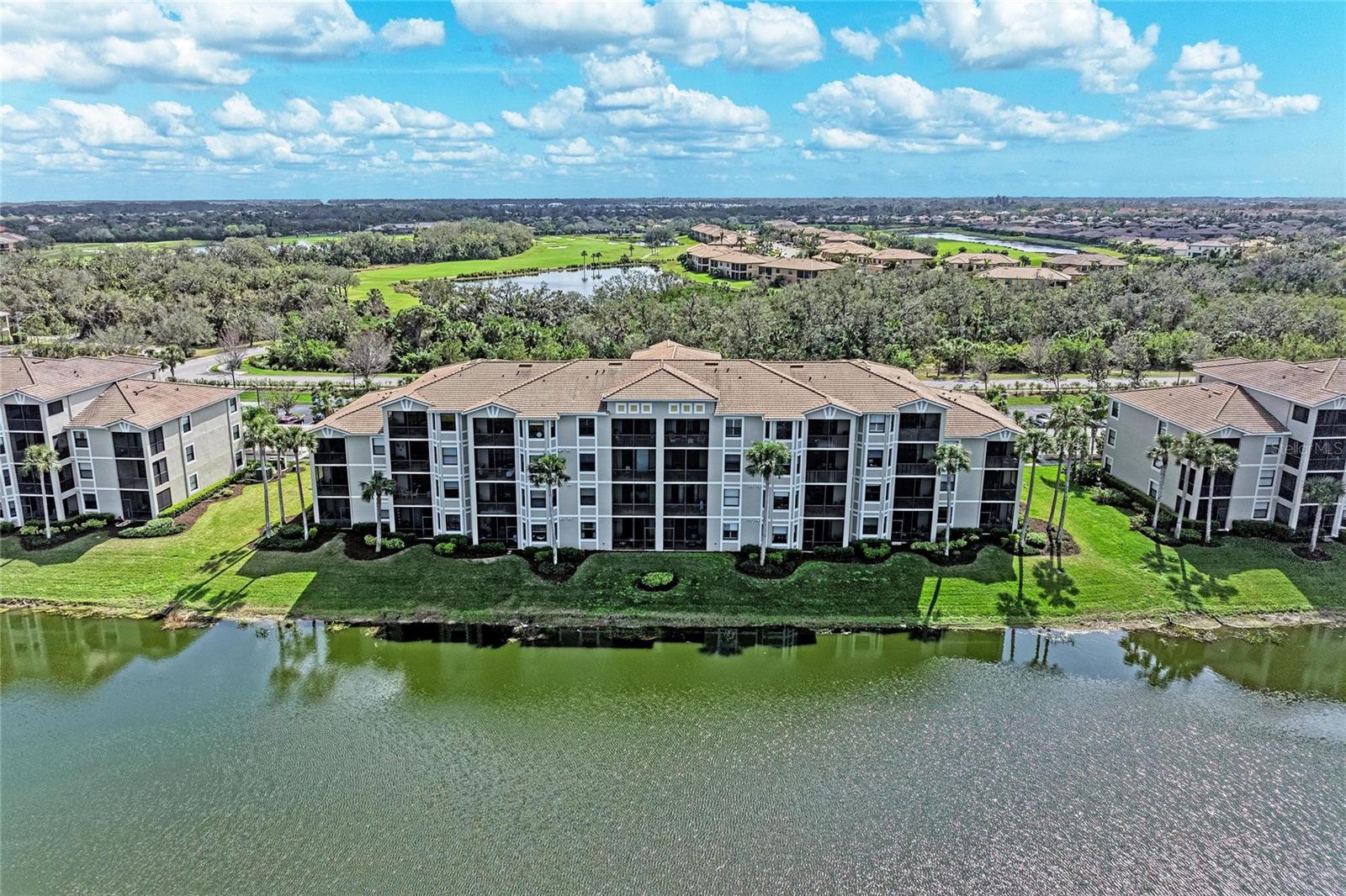 7019 RIVER HAMMOCK DR #202 — photo 2