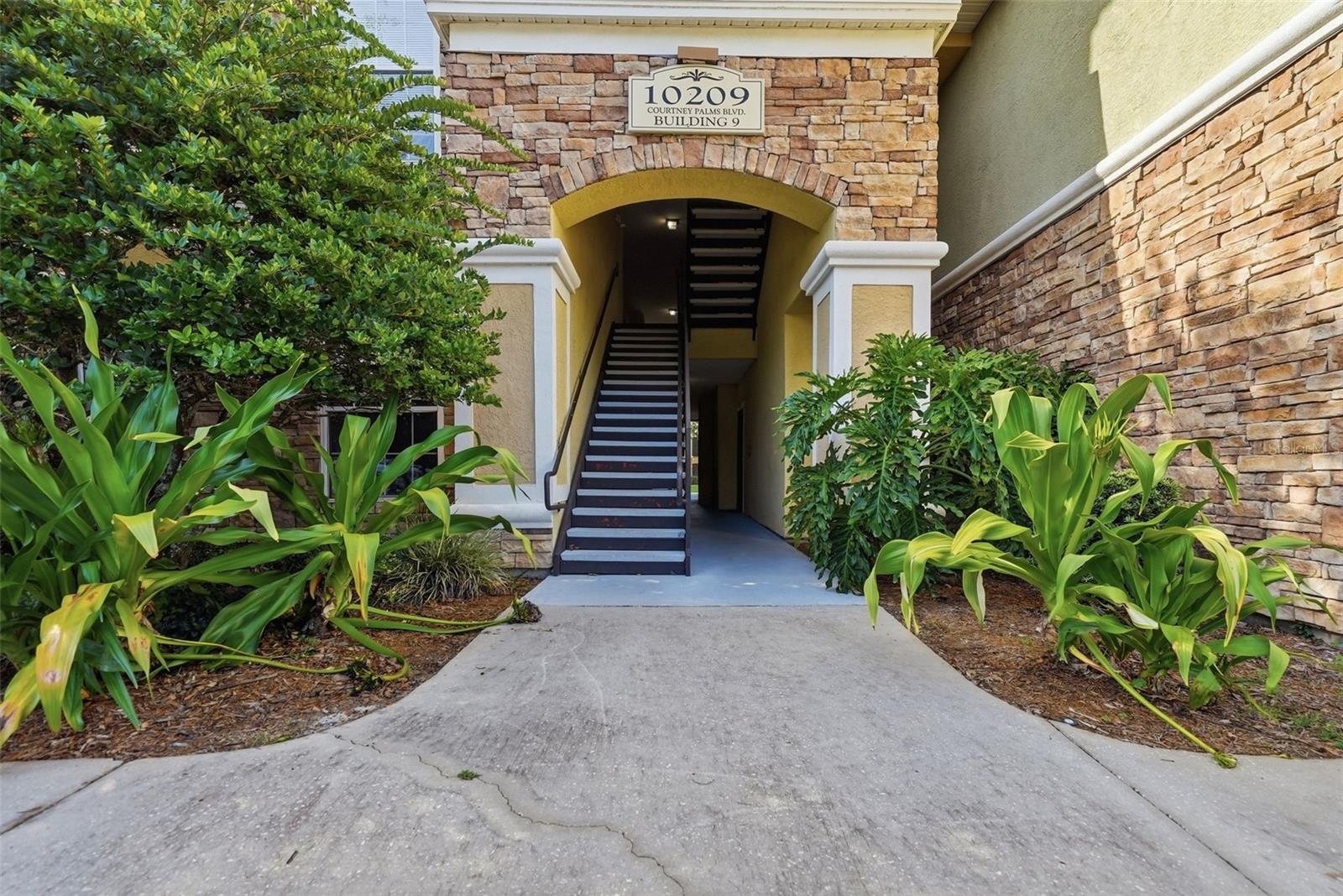 10209 COURTNEY PALMS BLVD #301 — photo 2