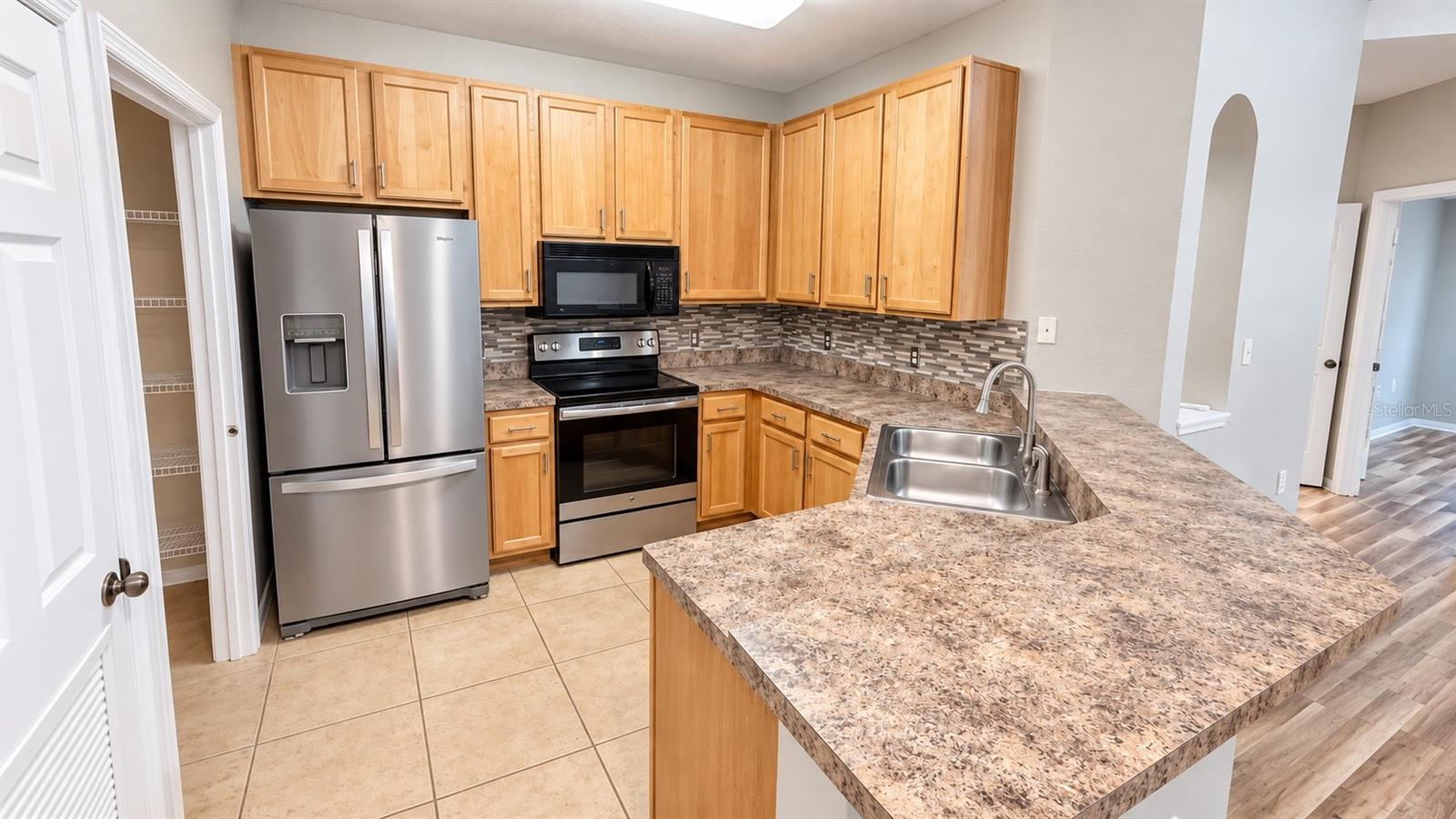 10209 COURTNEY PALMS BLVD #301 — photo 4