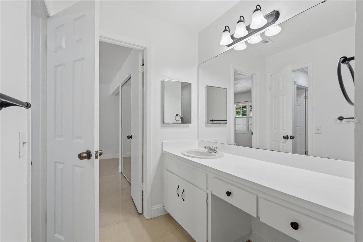 7047 SILVERMILL DR — photo 35