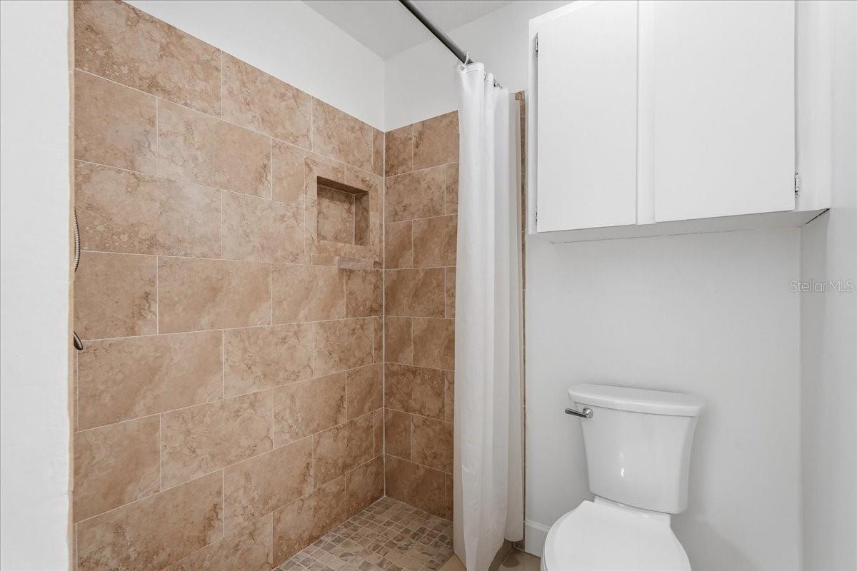 7047 SILVERMILL DR — photo 32