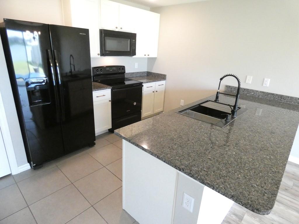 Home in ZEPHYRHILLS — photo 3