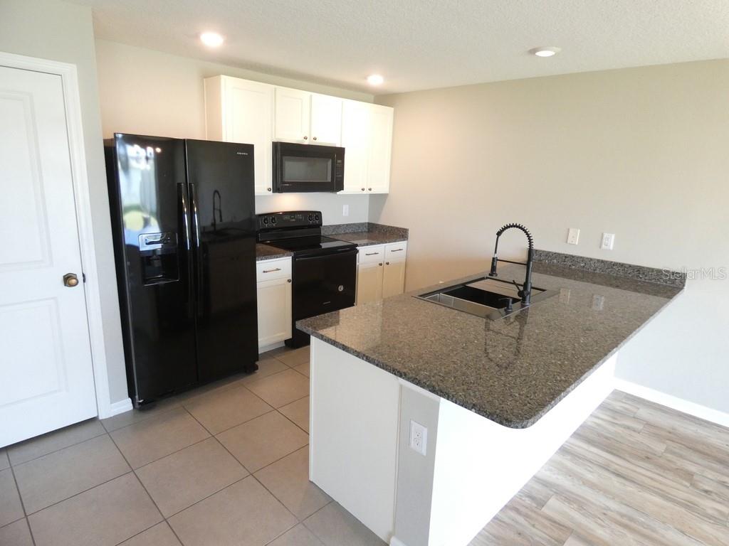 Home in ZEPHYRHILLS — photo 11