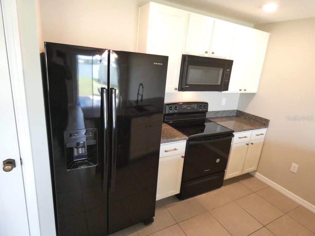 Home in ZEPHYRHILLS — photo 15