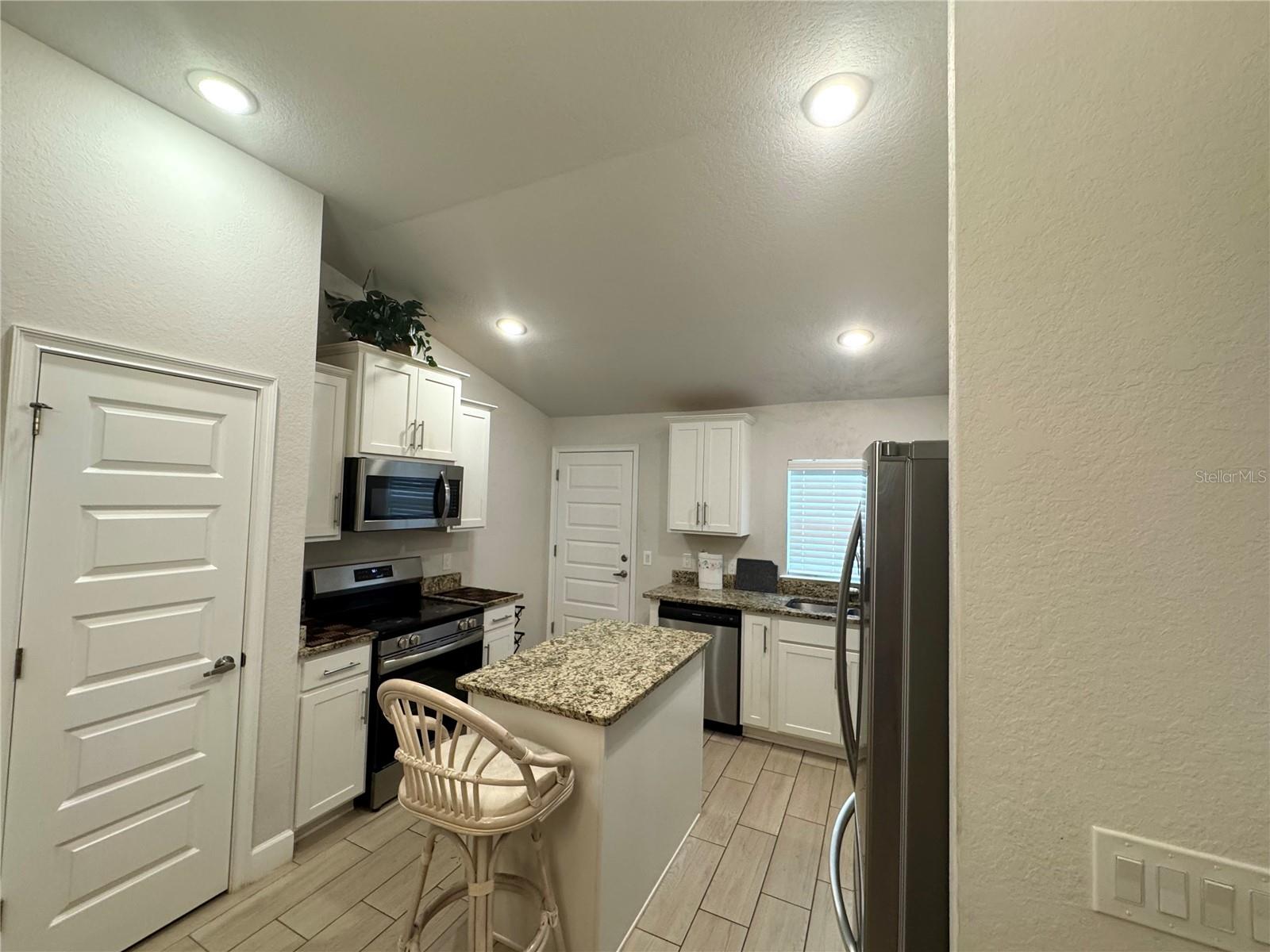 5672 KUMQUAT AVE — photo 8
