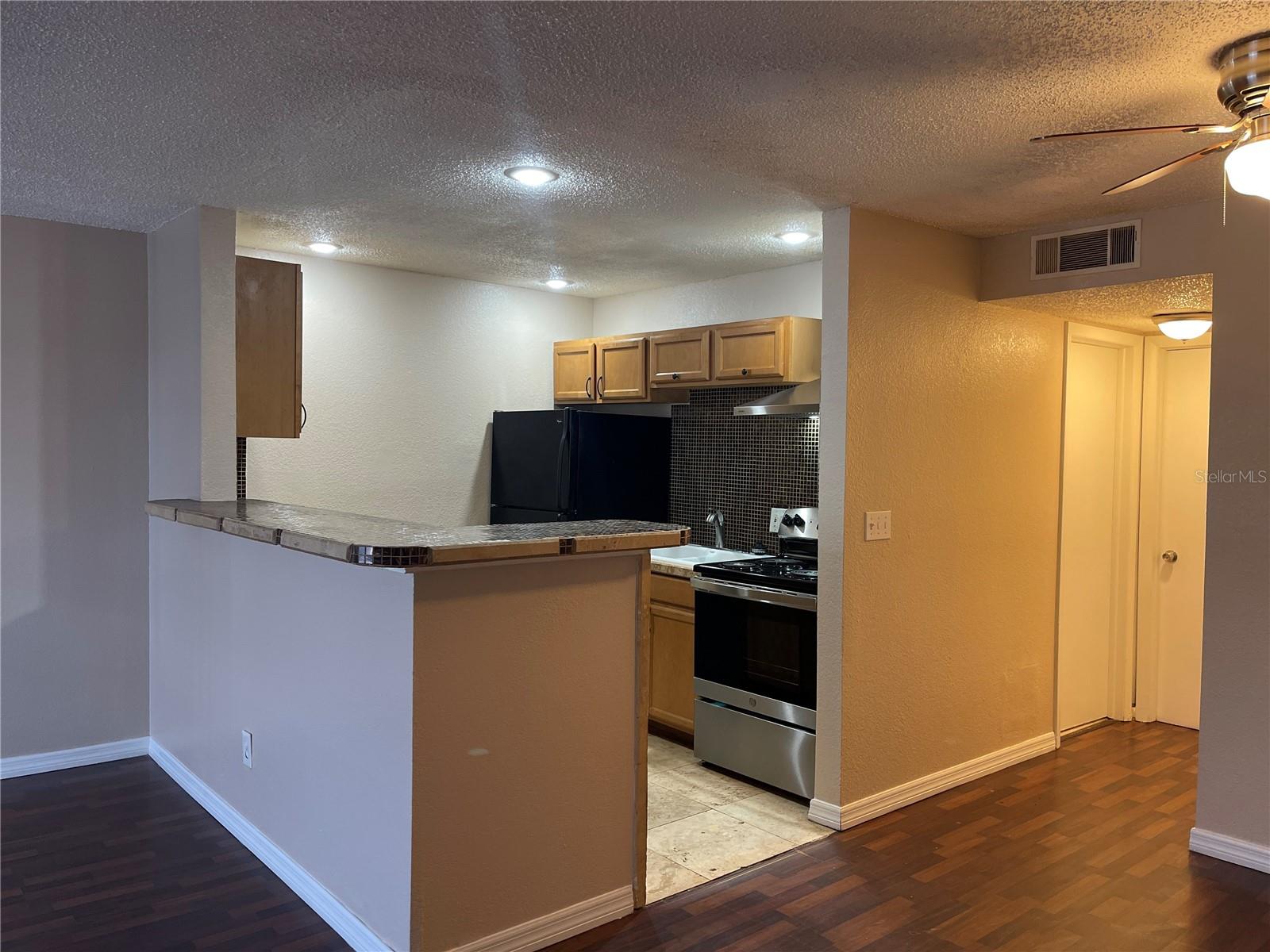 9105 W HILLSBOROUGH AVE #I104 — photo 9