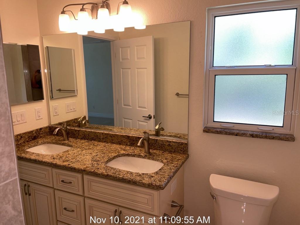 5999 RHAPSODY AVE — photo 10