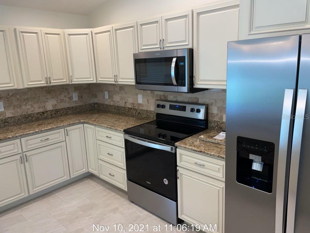 5999 RHAPSODY AVE — photo 5