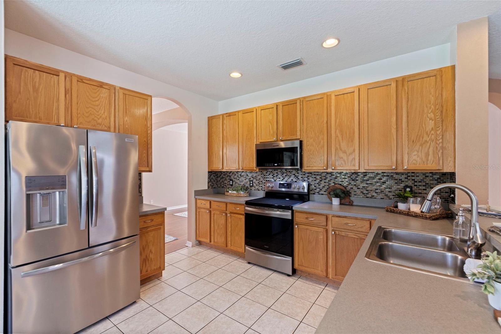 4758 WHISPERING WIND AVE — photo 15