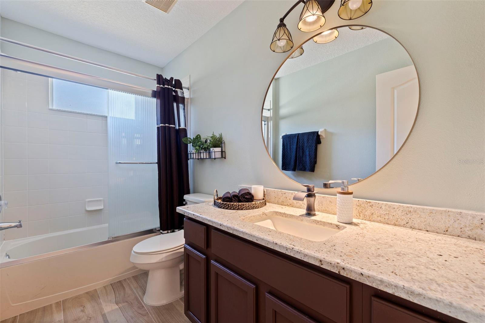 4758 WHISPERING WIND AVE — photo 33