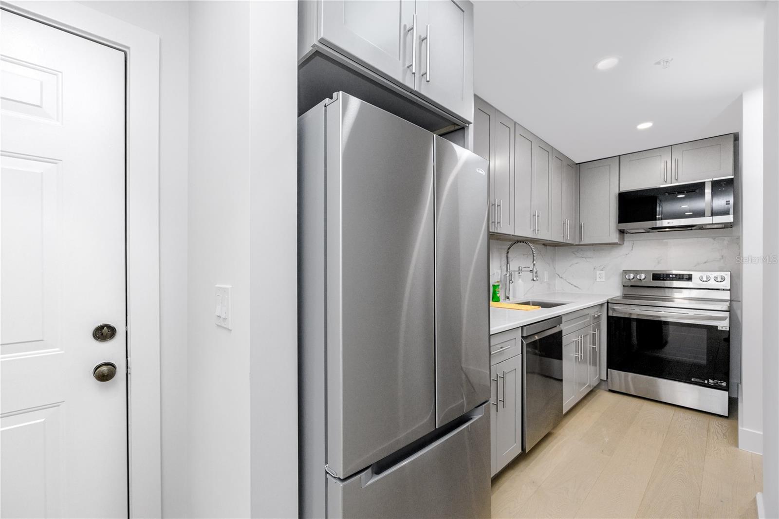 701 MIRROR LAKE DR N #206 — photo 13
