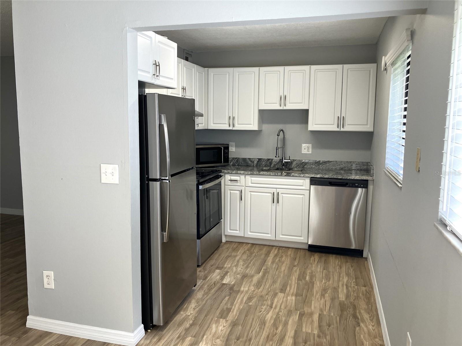 11703 RAINTREE VILLAGE BLVD #B — photo 17