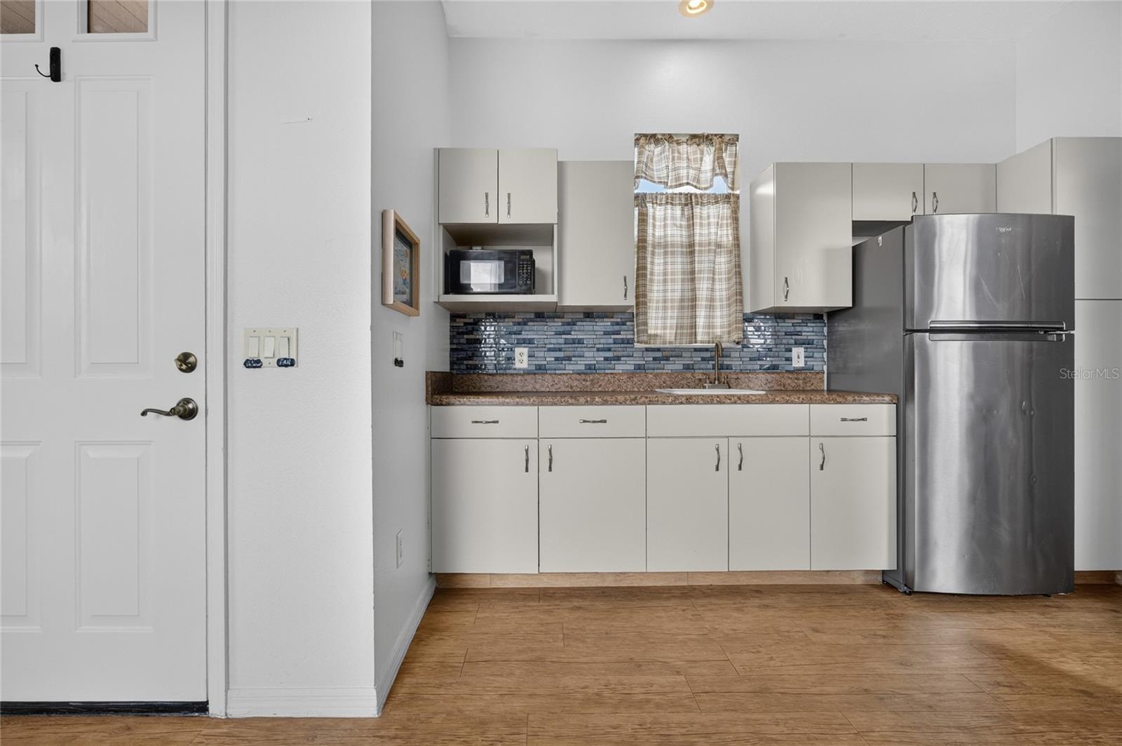 5660 RIVIERA CT — photo 38