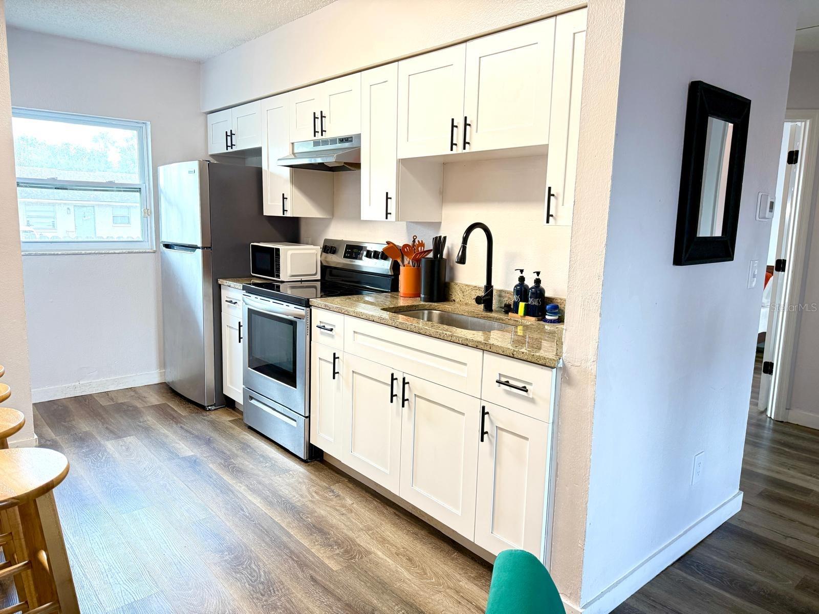 4590 76TH AVE N #102 — photo 3