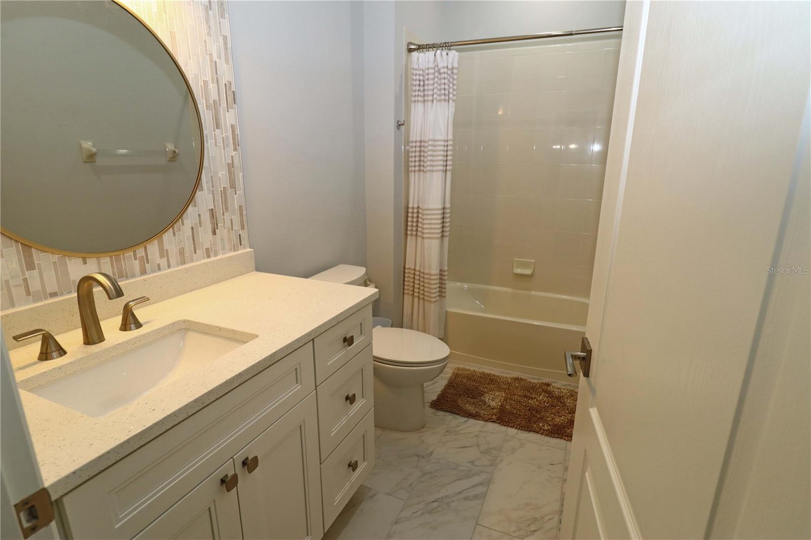 5107 WHISPERING OAKS DR — photo 16