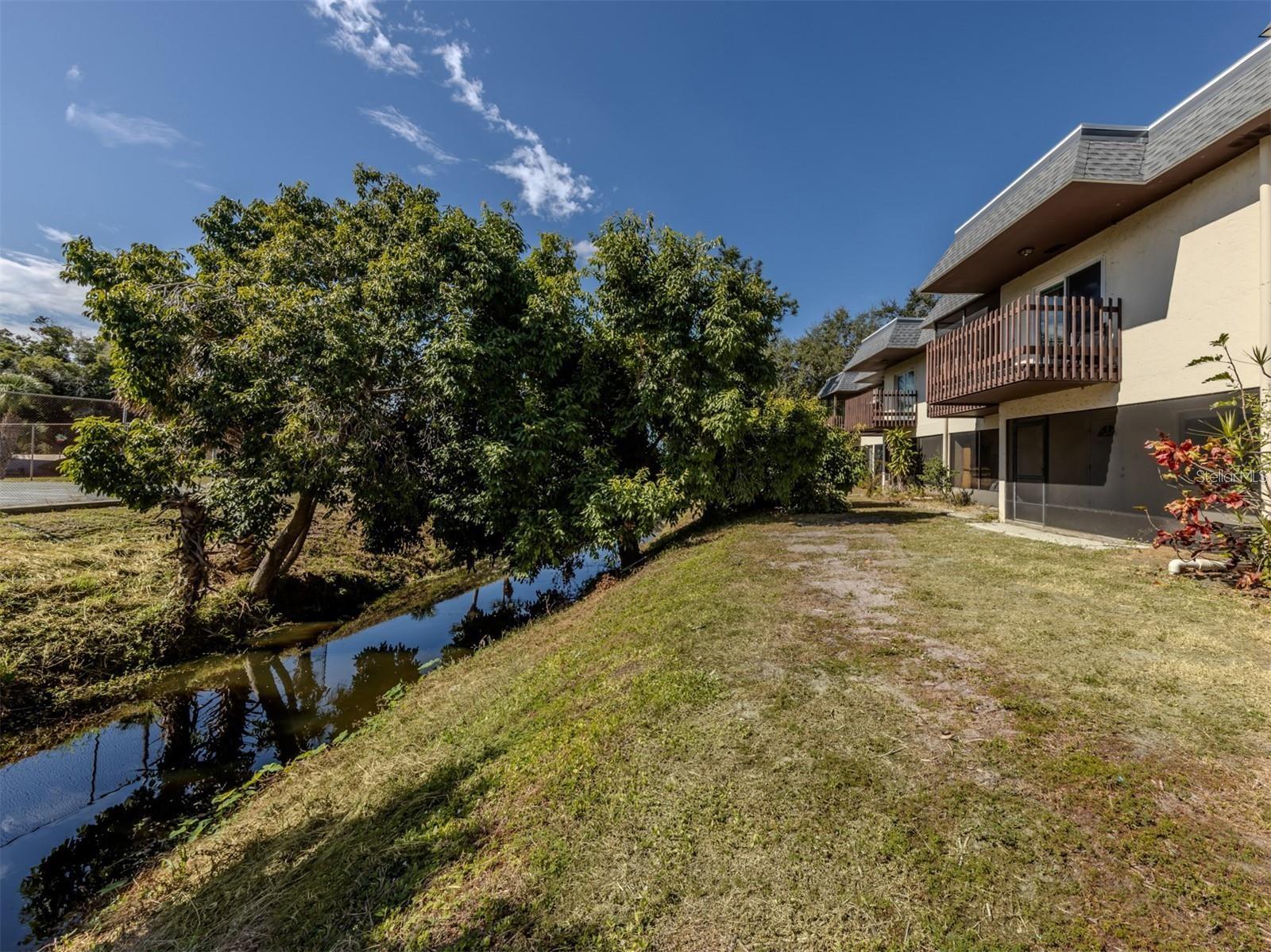 3208 RAMBLEWOOD DR N — photo 28