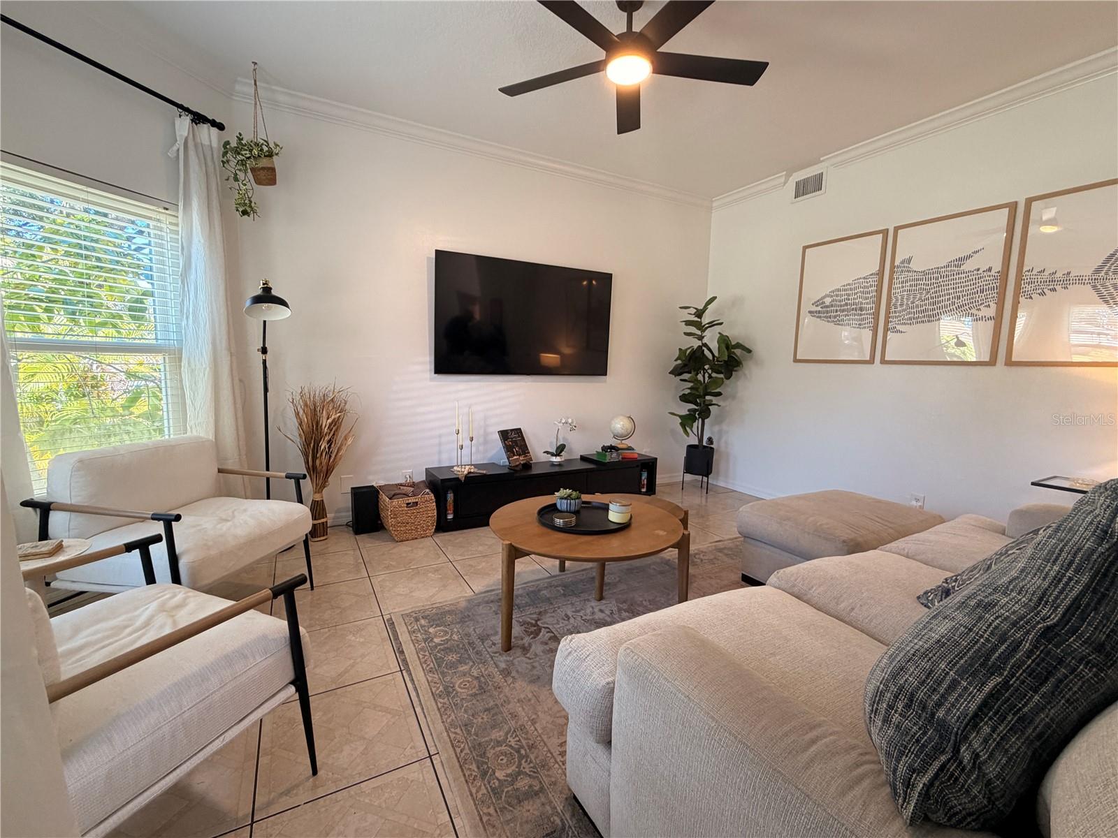7306 S MASCOTTE ST — photo 3